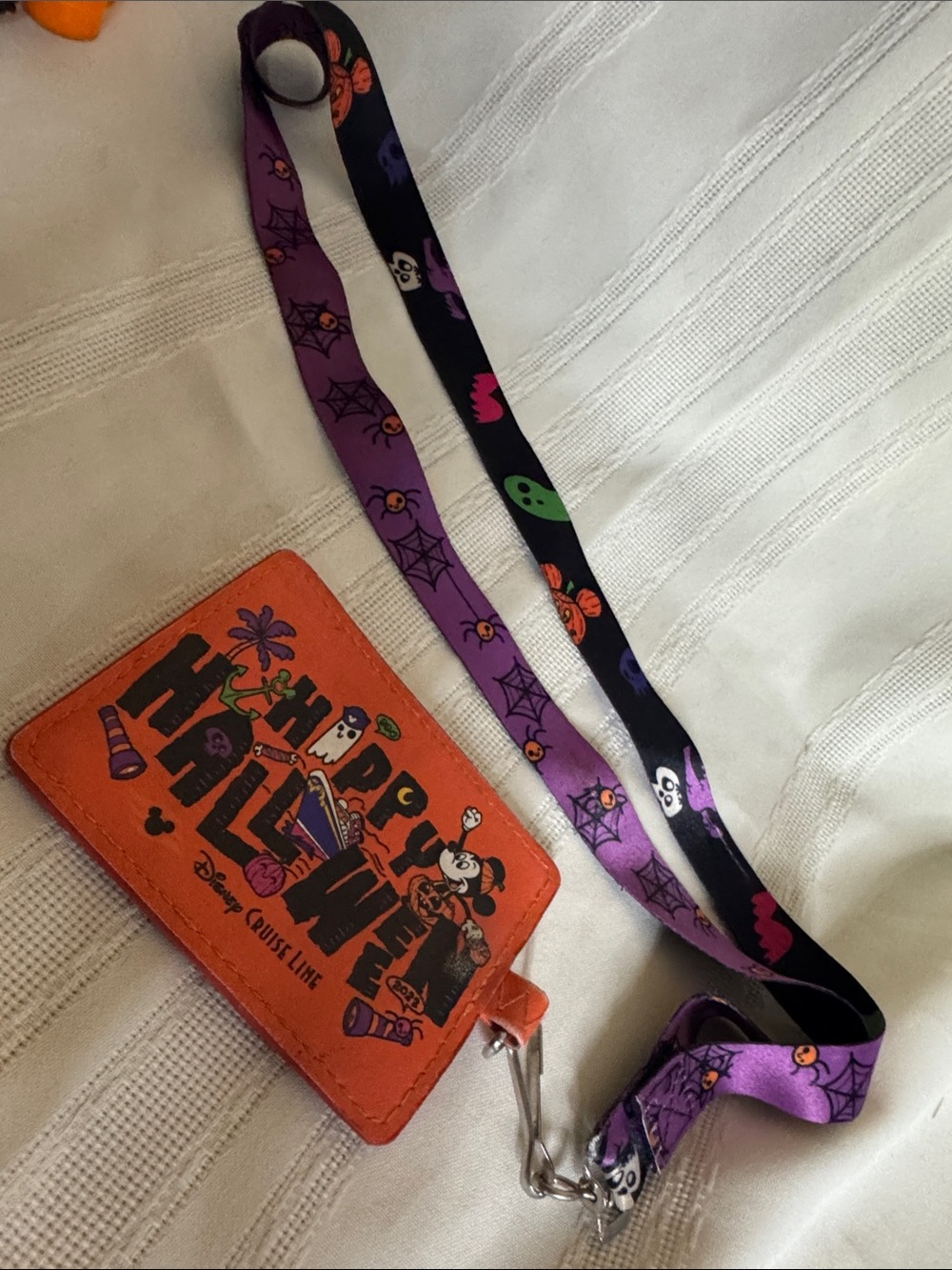 Disney Cruise Line "Happy Halloween" orange cardholder, purple & black lanyard
